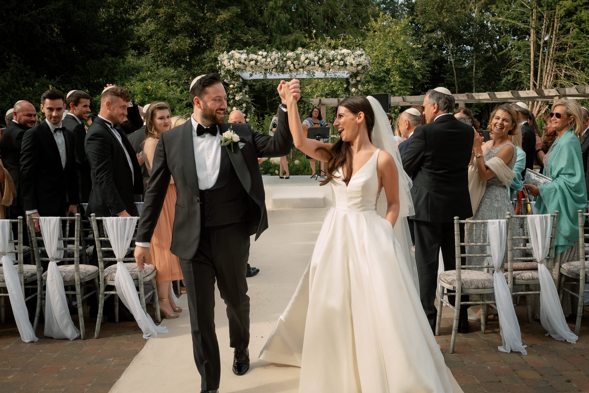 A couple celebrate their jewish wedding in Essex.