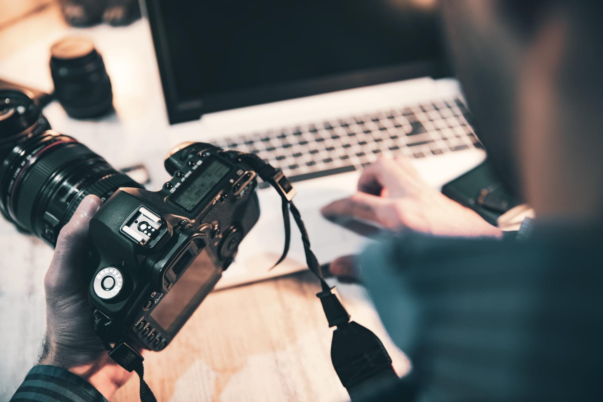 Professional photographer holding a camera